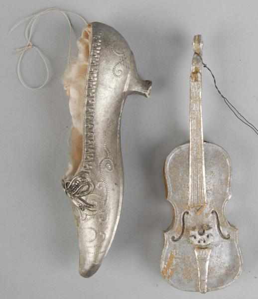 Appraisal: Lot of German Dresden Christmas Ornaments Description Includes one violin