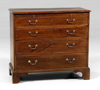 Appraisal: George III inlaid bachelor's chest figured mahogany top pull-out slide