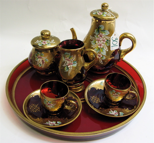 Appraisal: BAVARIAN RUBY RED TEA SET WITH TRAY ornate gold and