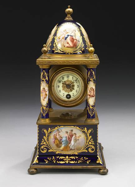 Appraisal: A Vienna style porcelain portico timepiece early th century Surmounted