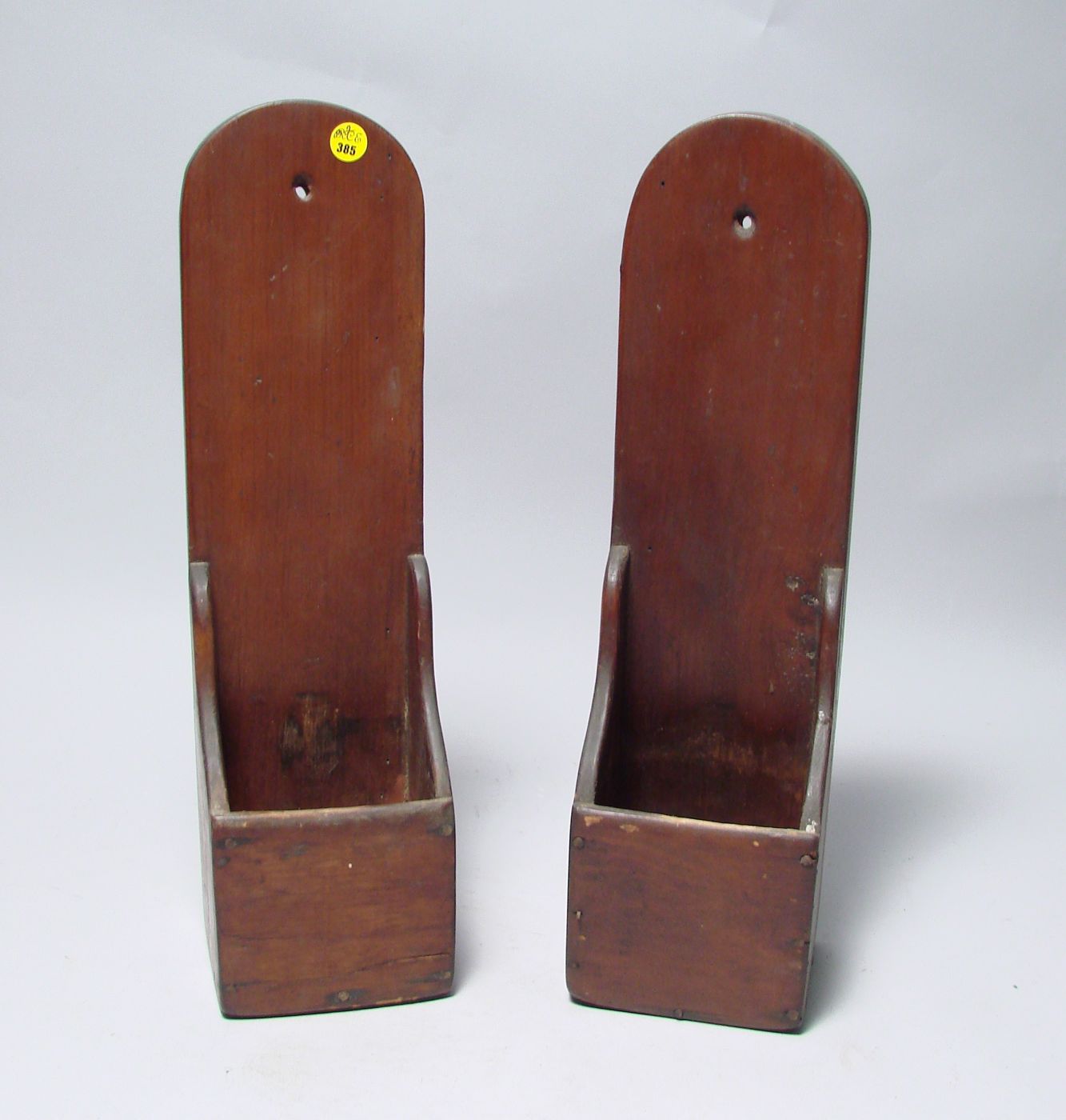 Appraisal: TWO WOODEN CANDLE SCONCES th CenturyIn pine Heights Widths Depths