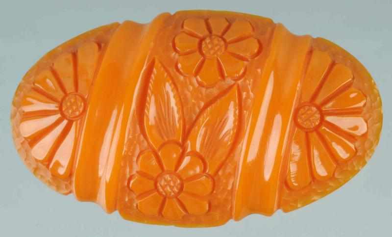 Appraisal: Bakelite Carved Floral Pin Condition Excellent Size L