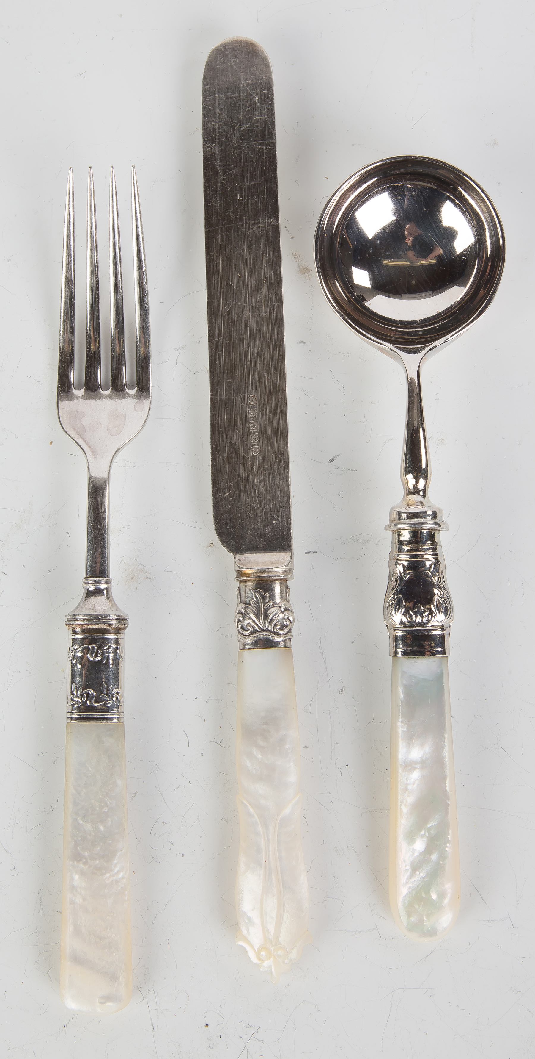 Appraisal: Silver Plate and Mother of Pearl Flatware spoons forks knives