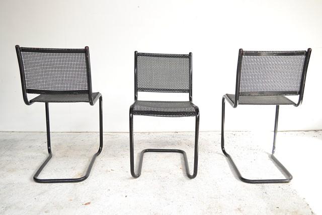 Appraisal: A SET OF SIX BLACK CANTILEVER CHAIRS ATTRIBUTED TO VICO