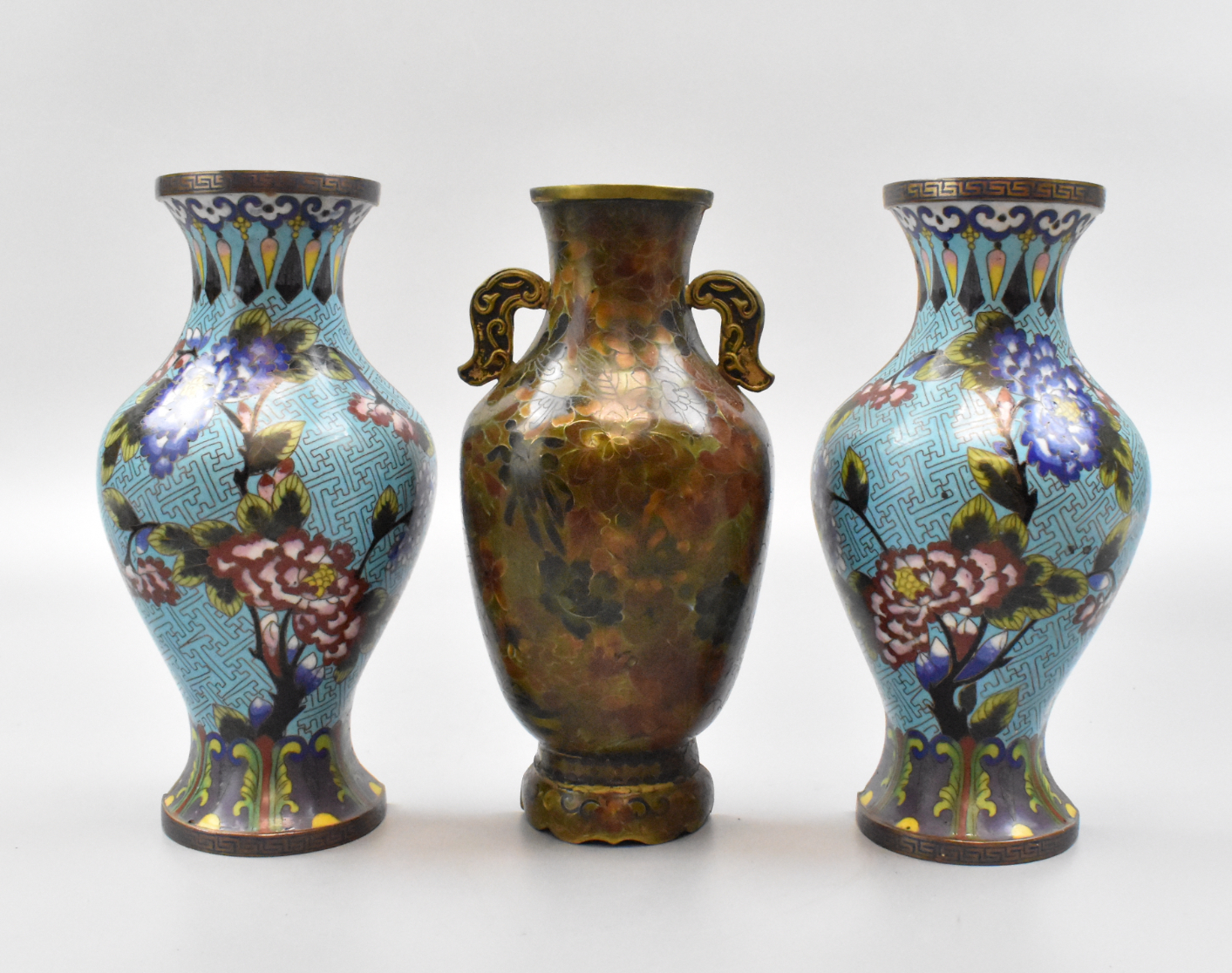 Appraisal: Three Chinese cloisonne wall vases Two with turquoise blue background