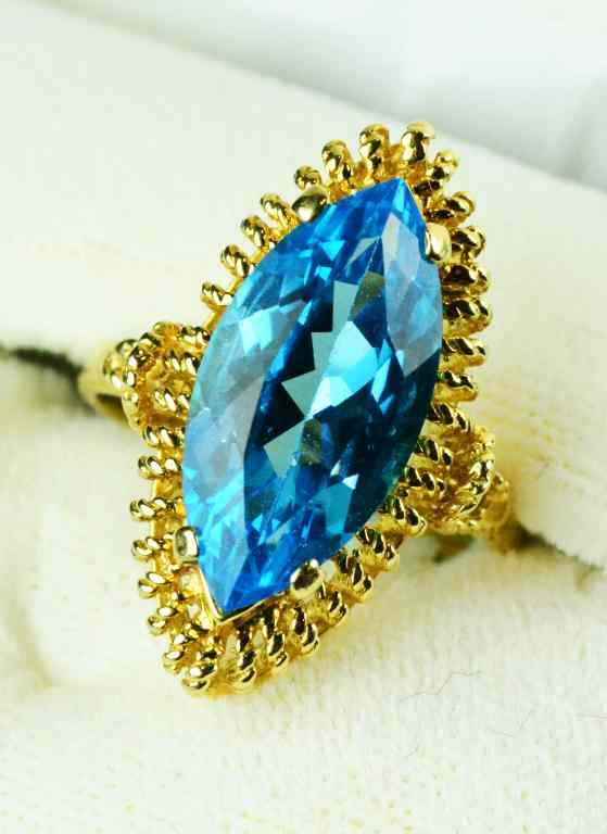 Appraisal: K Gold And Blue Topaz RingHaving a marquis cut topaz