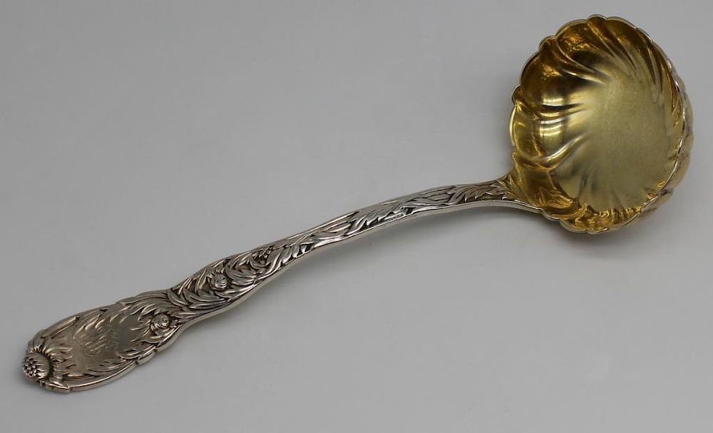 Appraisal: STERLING Tiffany Co Chrysanthemum Gravy Ladle Tiffany Co monogrammed Chrysanthemum