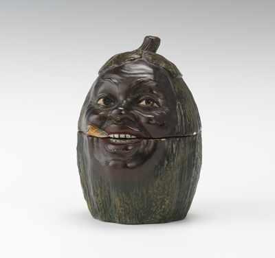 Appraisal: A Black Americana Smoking Head Tobacco Jar Terracotta with polychrome