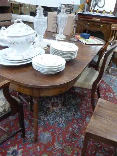 Appraisal: A REGENCY MAHOGANY 'D' END DINING TABLE with ring turned