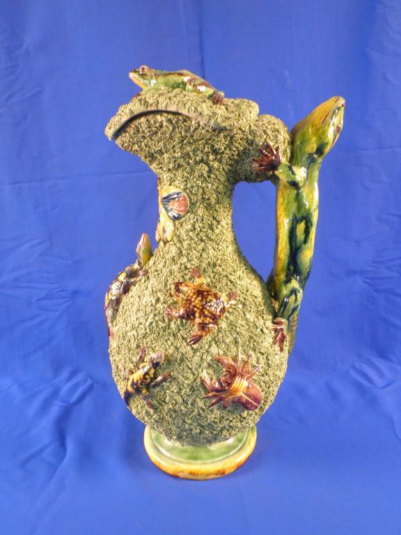 Appraisal: A late thC Portuguese Palissy type jug and cover applied