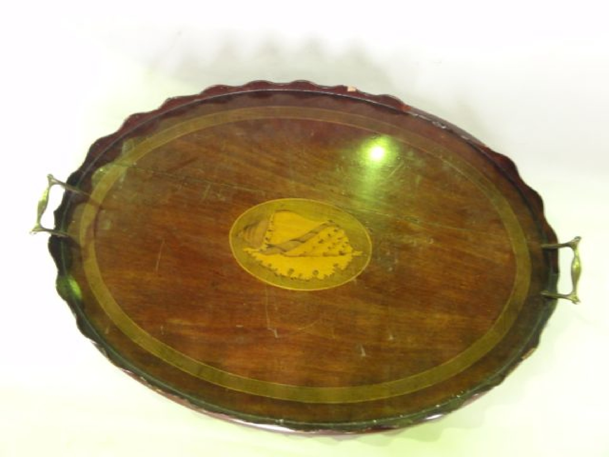 Appraisal: A good quality Georgian mahogany tray of oval form with