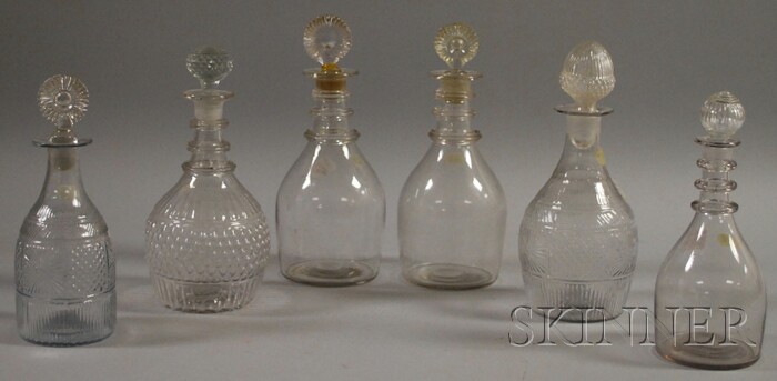 Appraisal: Six Colorless Blown Molded Glass Decanters