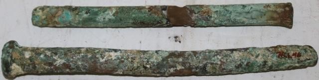 Appraisal: TWO LATE TH CENTURY HEAVY BRONZE SHIPS SPIKESRECOVERED FROM THE