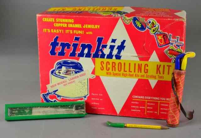 Appraisal: Trinket Scrolling Kit And School AccessoriesIncluding a Trinket Scrolling Kit