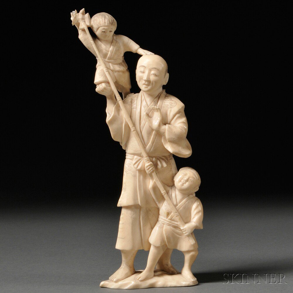 Appraisal: Ivory Figural Group Japan th th century a man and