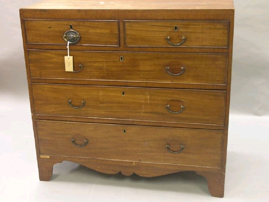 Appraisal: A George III mahogany chest two short and three long