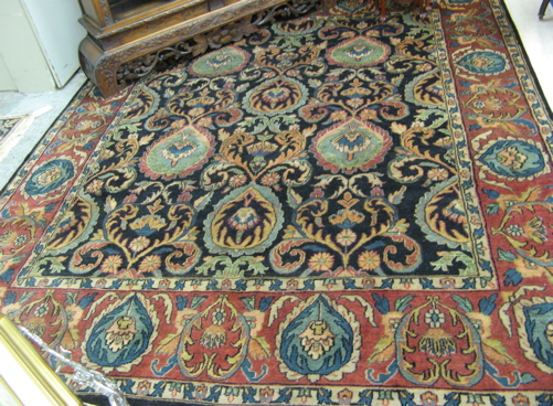 Appraisal: HAND KNOTTED ORIENTAL CARPET Indo-Persian overall floral design on rectangular