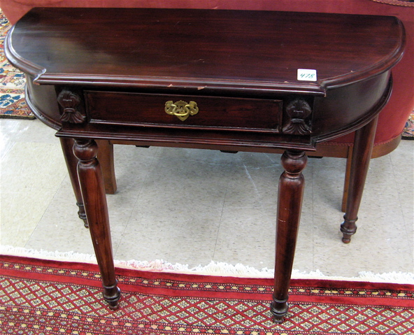 Appraisal: MAHOGANY CONSOLE TABLE having a flat-front demilune top with drawer