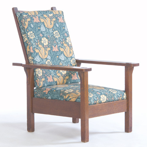 Appraisal: GUSTAV STICKLEY Morris chair with open-arms and a drop-in spring