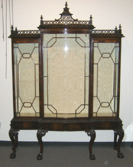 Appraisal: CHIPPENDALE STYLE MAHOGANY DISPLAY CABINET Breakfront top with large gadrooned