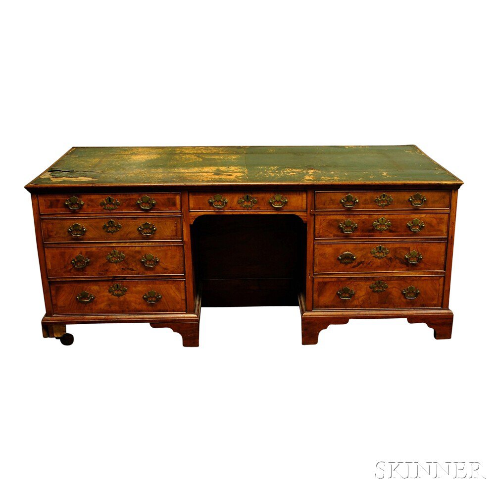 Appraisal: Walnut Veneer Partner's Desk England th century the rectangular top