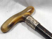 Appraisal: A silver mounted horn handled ebonised walking stick circa