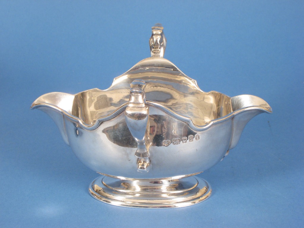 Appraisal: A George V two handled double lipped Sauce Boat engraved