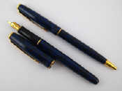 Appraisal: A Parker Sonnet pen and pencil set with mottled blue