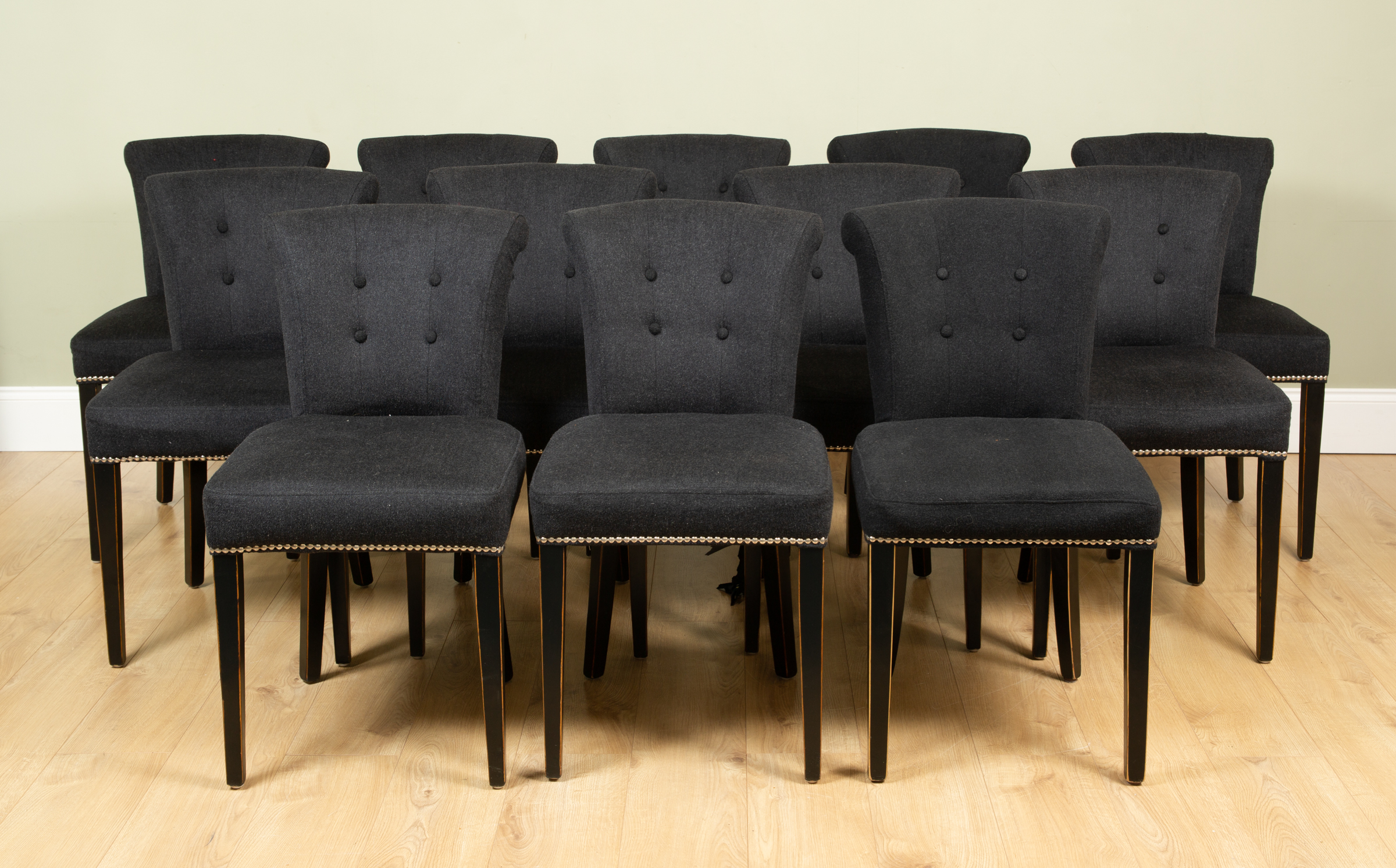 Appraisal: A set of twelve Eichholtz contemporary dining chairs upholstered in