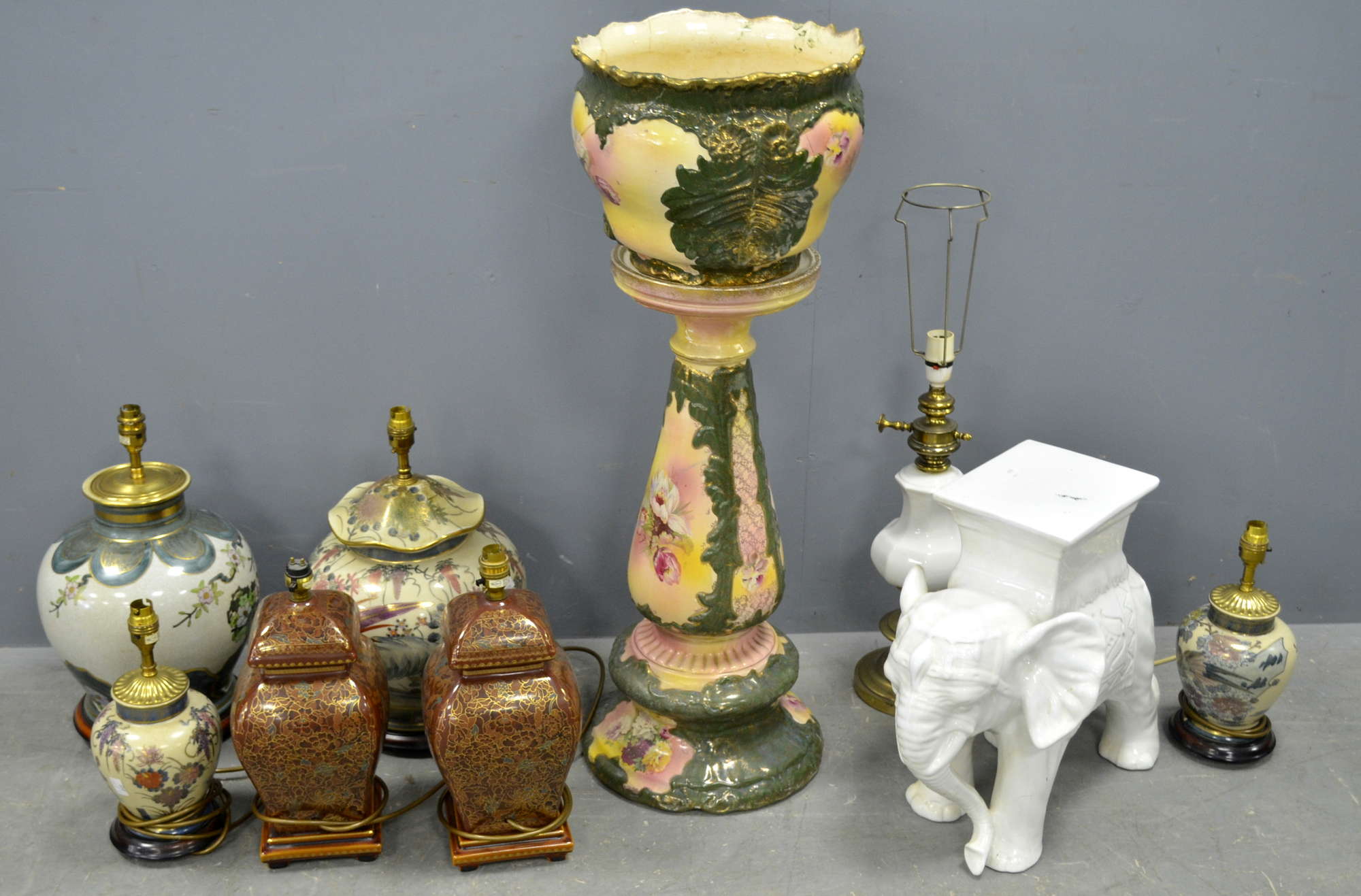 Appraisal: Jardiniere an elephant stool and seven various table lamps