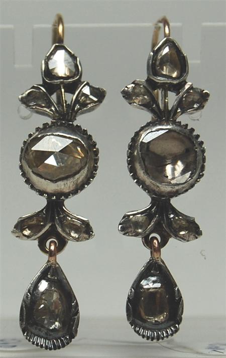 Appraisal: A pair of Georgian diamond pendant earrings each composed of