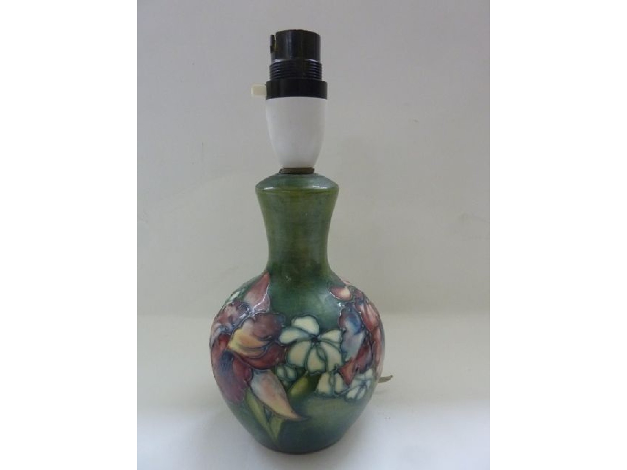 Appraisal: A Moorcroft vase shaped table lamp with trailing floral detail