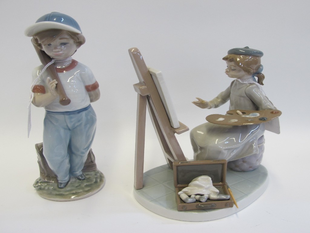 Appraisal: Two Lladro figures of a boy playing baseball and a