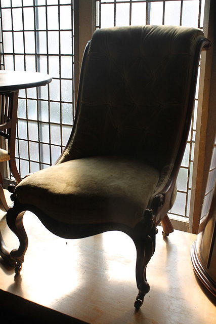 Appraisal: A VICTORIAN MAHOGANY SCROLL BACK LADIES CHAIR with buttoned upholstery