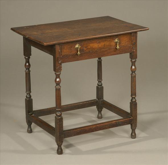 Appraisal: An oak side table part George III with a shallow