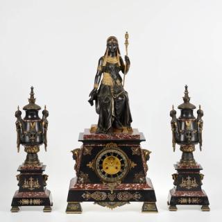 Appraisal: Egyptian Revival bronze and marble clock garniture th c black