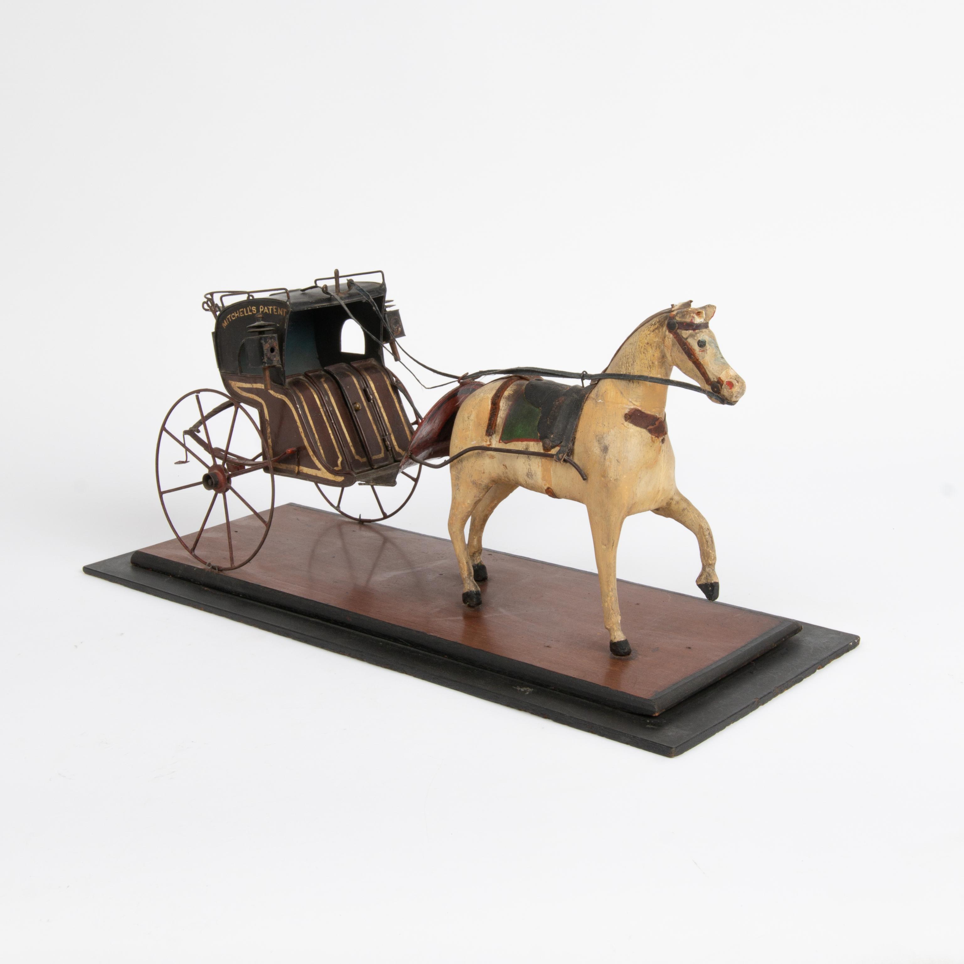 Appraisal: FOLK ART PAINTED WOOD AND TIN HORSE AND CARRIAGE A