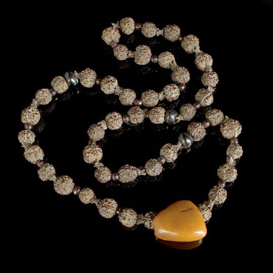 Appraisal: Unusual Tibetan Amber and Seed Necklace composed of a length