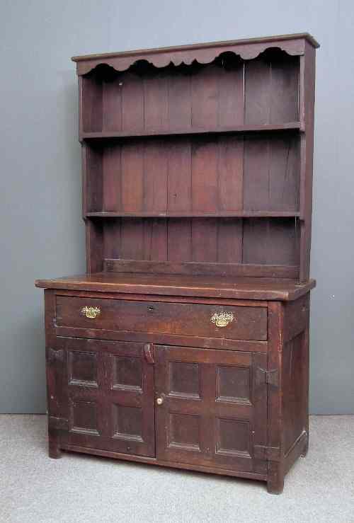 Appraisal: An old panelled oak dresser of th Century design the