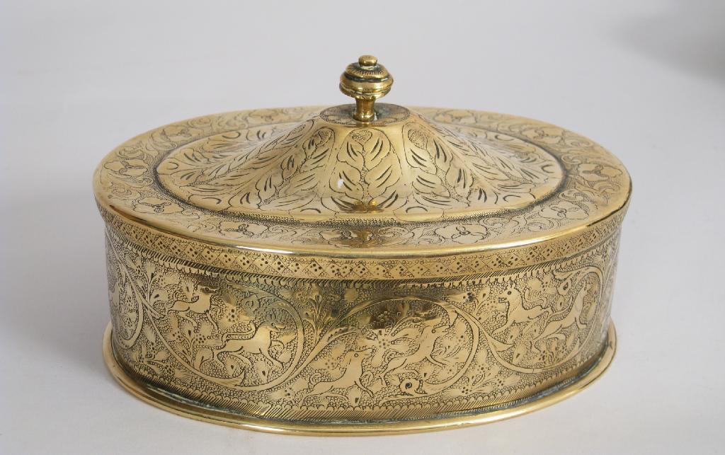 Appraisal: An oval shaped Indian brass oval Box finely engraved all