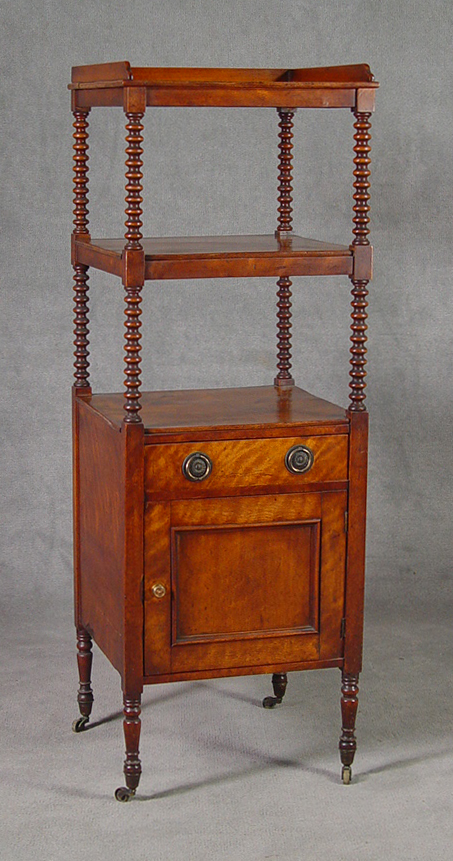 Appraisal: Victorian Walnut Satinwood Etagere Circa Spool turned supports for three