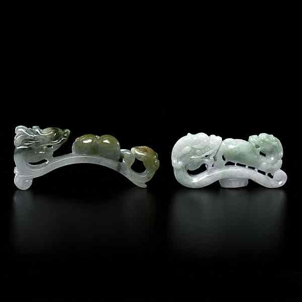 Appraisal: Chinese Jadeite Dragon Carvings Chinese Two jadeite dragon carvings one