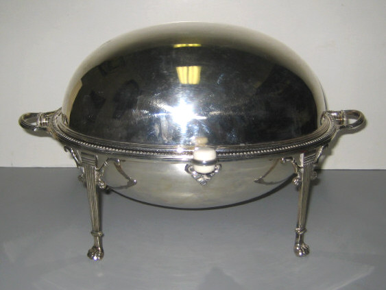 Appraisal: ENGLISH PLATED SILVER ROLL-TOP BACON DISH Typical oval form raised