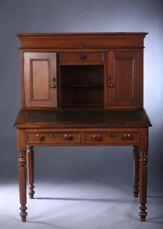 Appraisal: EMPIRE MAHOGANY SECRETARY DESK th century in two sections Shelving