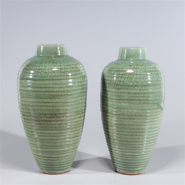 Appraisal: Two large Chinese celadon crackle glazed ceramic vases overall good