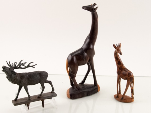 Appraisal: Two Carved African Animals and an Elk Hood Ornamen To