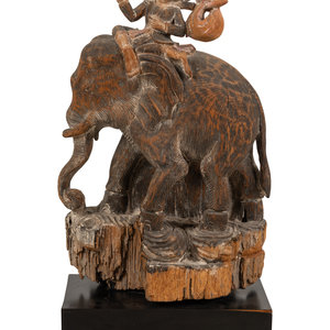 Appraisal: A Southeast Asian Carved and Painted Wood Group of an