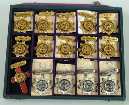 Appraisal: SALESMAN SAMPLE DISPLAY CASE AND CATALOG OF MEDALS BADGES WHITE