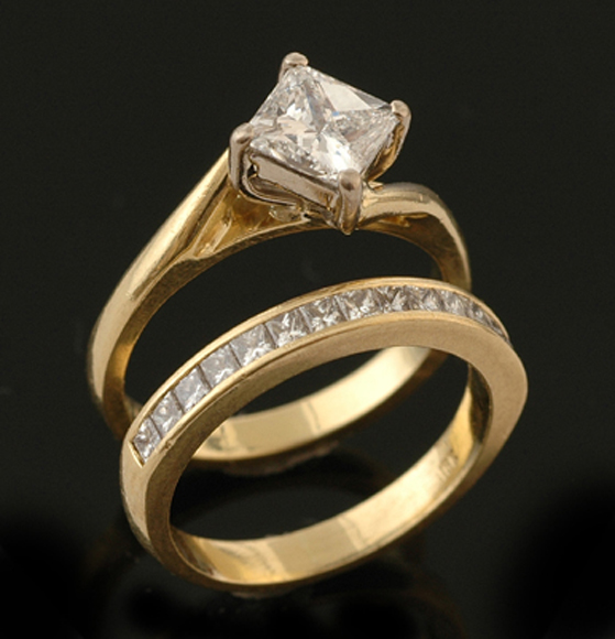 Appraisal: A princess cut diamond solitaire ring The pricess cut diamond