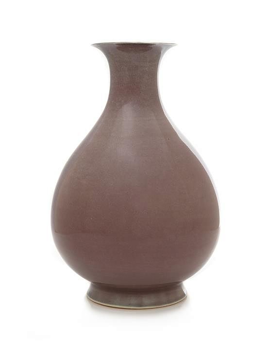 Appraisal: A Copper Red Glazed Porcelain Vase Yuhuchun Ping Height inches